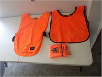 Lot of three orange hunting safety vests!
