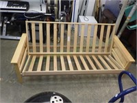 Wood crafted futon frame w/decorative end panels