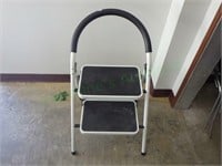 Folding two-step ladder with padded support