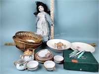 Doll, child's tea set, baskets