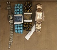 GROUP OF WATCHES AND BRACELETS