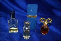 4 Miniature Perfume Bottles