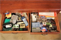 Contents inside coffee table drawers