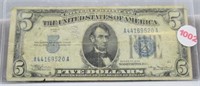 1934 Blue seal 5 dollar silver certificate.