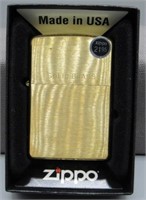 Solid brass Zippo lighter with box.