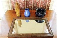 Antique mirror with pottery