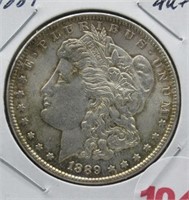 1889 AU Morgan silver dollar.