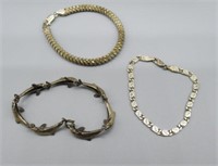 (3) Sterling silver bracelets including dolphin.