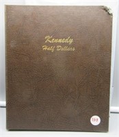 Kennedy half dollar book with 24 total coins.