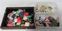 Collection of advertising buttons and keychains.