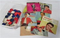 Collection of Elvis 45 records with poker chips.
