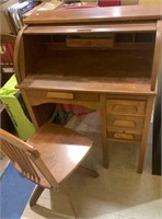 Child size work desk with matching chair. Roll