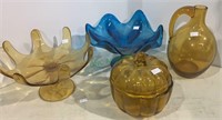 3 amber glass pieces and one bright blue compote