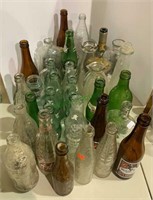 About 40 vintage bottles including Coca-Cola