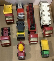 8 Tonka Toy trucks - metal and plastic including