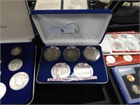 BOXED COLLECTION OF FIVE US SILVER MORGAN DOLLARS