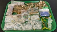 Tray lot - beaded bracelets, loose beads, etc.