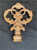 Fancy cast iron finials. 5 inches tall with a