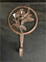 Decorative cast-iron coat hooks. 8 1/2 inches