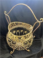 Big metal basket with ginkgo leaf decorations. 22