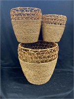 Set of three wicker baskets, with metal frames