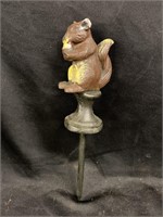 Cast iron squirrel hose guard. Little guy just