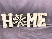 Three dimensional metal home sign. 19 inches long