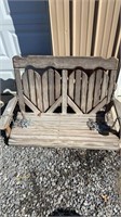 Wooden porch swing