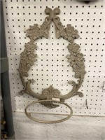 Cast iron wall decoration with pot ring. 19