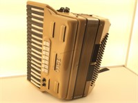 Tan and Black Inverted Tiger Combo Accordion.