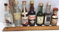 Lot of 7 Liqueur Bottles with 4 tax stamps