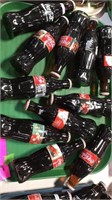 Tray lot of coke bottles