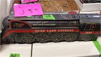 Tin railroad car. Over land express