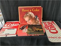 Group of 4 Coca-Cola advertisement signs