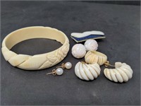 Group of bone jewelry with some gold PB