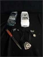 Group of  diecast cars and jewelry