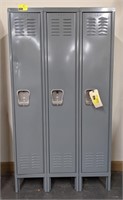 Three metal locker unit. Measures 66" h x 33" w x