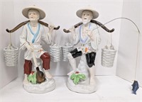 Two porcelain asian fisherman statues. Marked