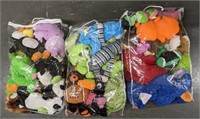 Three 16" x 20" storage bags filled with plush