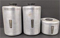 Three mid- century aluminum canisters - Flour,
