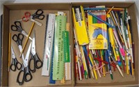 Flats of pencils rulers and scissors
