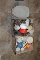 lot of misc. cups and tupperware