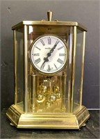 Howard Miller Clock in Gold Glass Case*