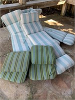 Four lounge chair cushions and two regular side