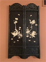 Japanese lacquered screen with bone decorations.