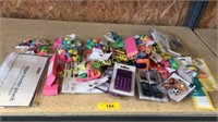 Erasers, calculator binder, pouch, school items