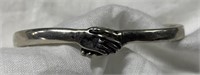 Unusual Sterling Silver Clasped Hands Bracelet