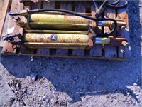 (2) John Deere cylinders