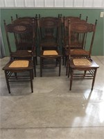 Antique spindle back cane bottom chairs (8)