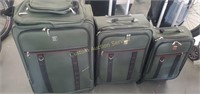 3 rolling suitcases (one large, one medium, one